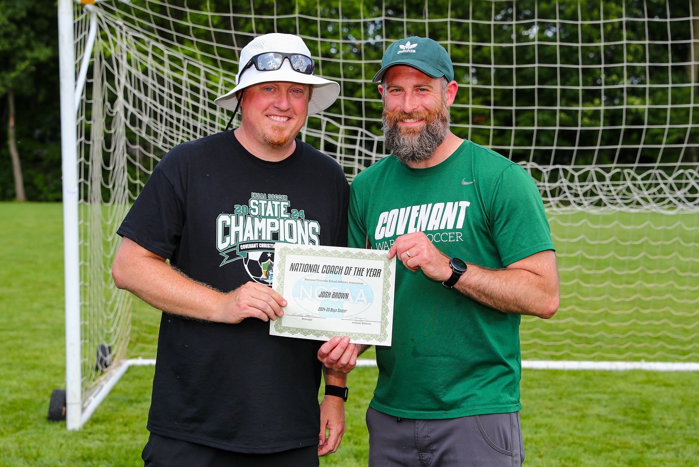 Covenant coaches with the NCSAA National Coach of the Year certificate for boys soccer